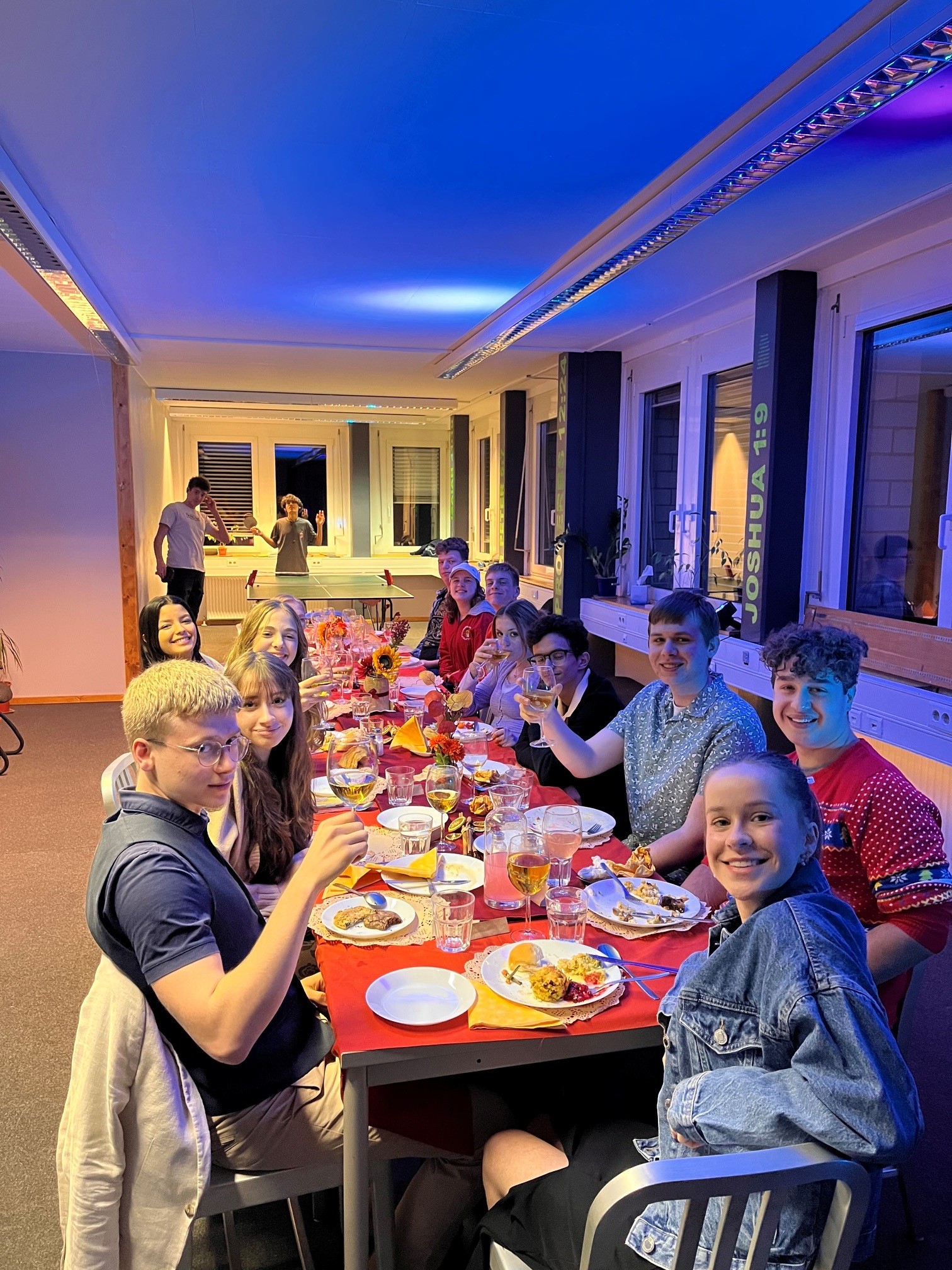 Young people sharing a meal at a meetup